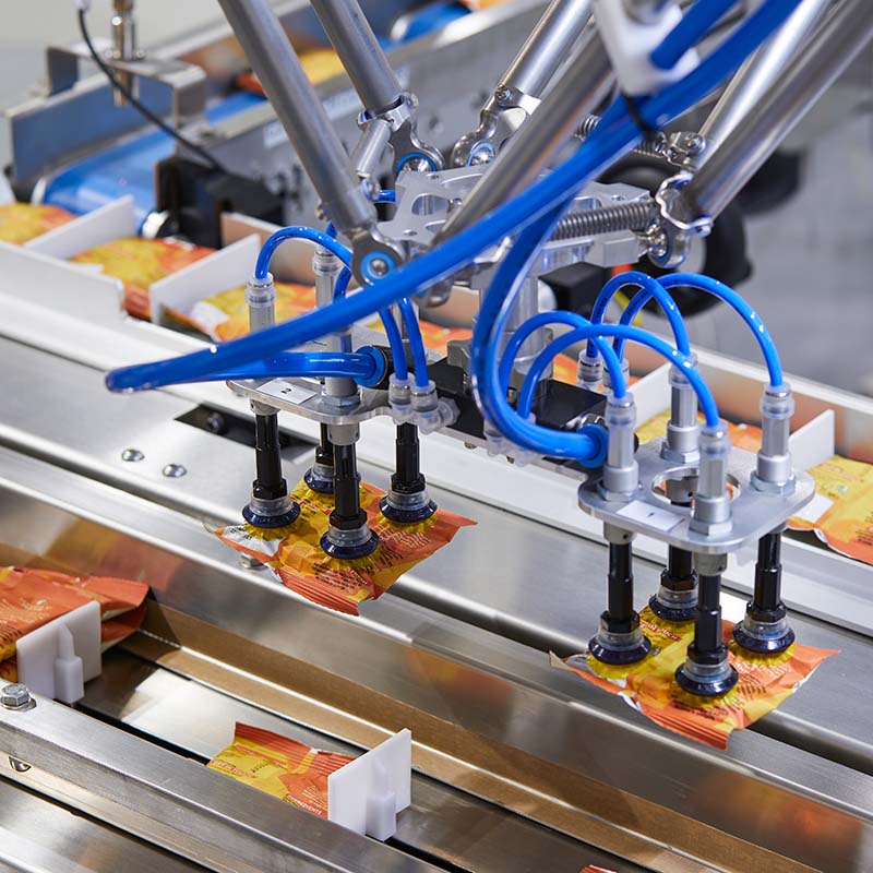 Robotic Pick And Place Cell | Automatic Loading of VFFS Bags into Infeed Conveyor of Multipack Flow Wrapper